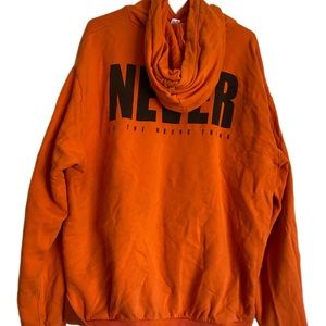 “Bright orange graphic hoodie